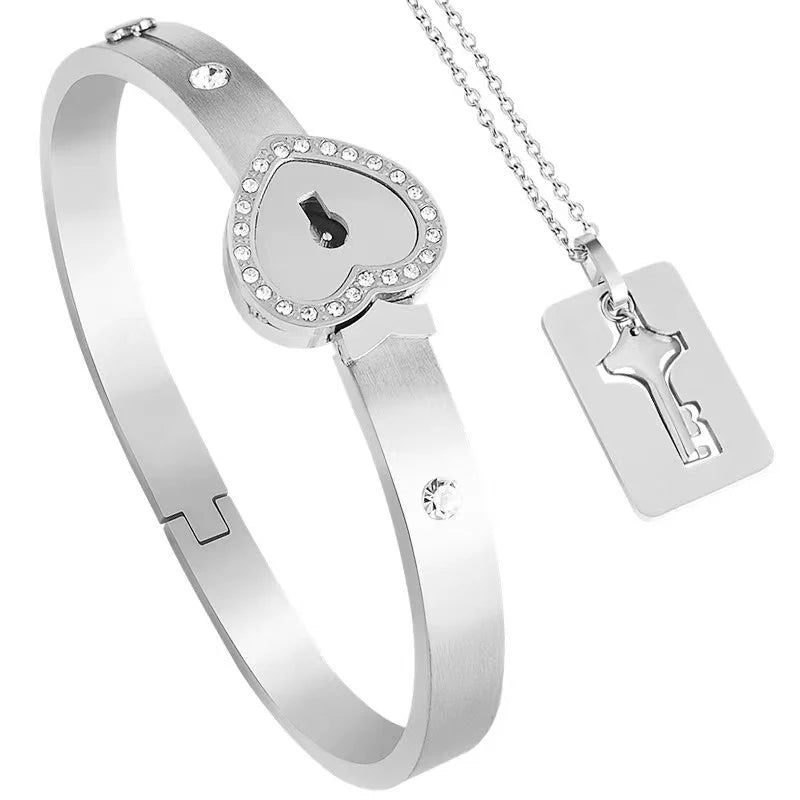 Set Corazón: Collar llave y Pulsera corazón color plata